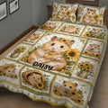 Close bedroom view of a hamster quilt blanket featuring sunflower panels and playful small-pet artwork