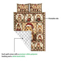Close view of Christmas hamster quilt showing the printed front and white quilted backing