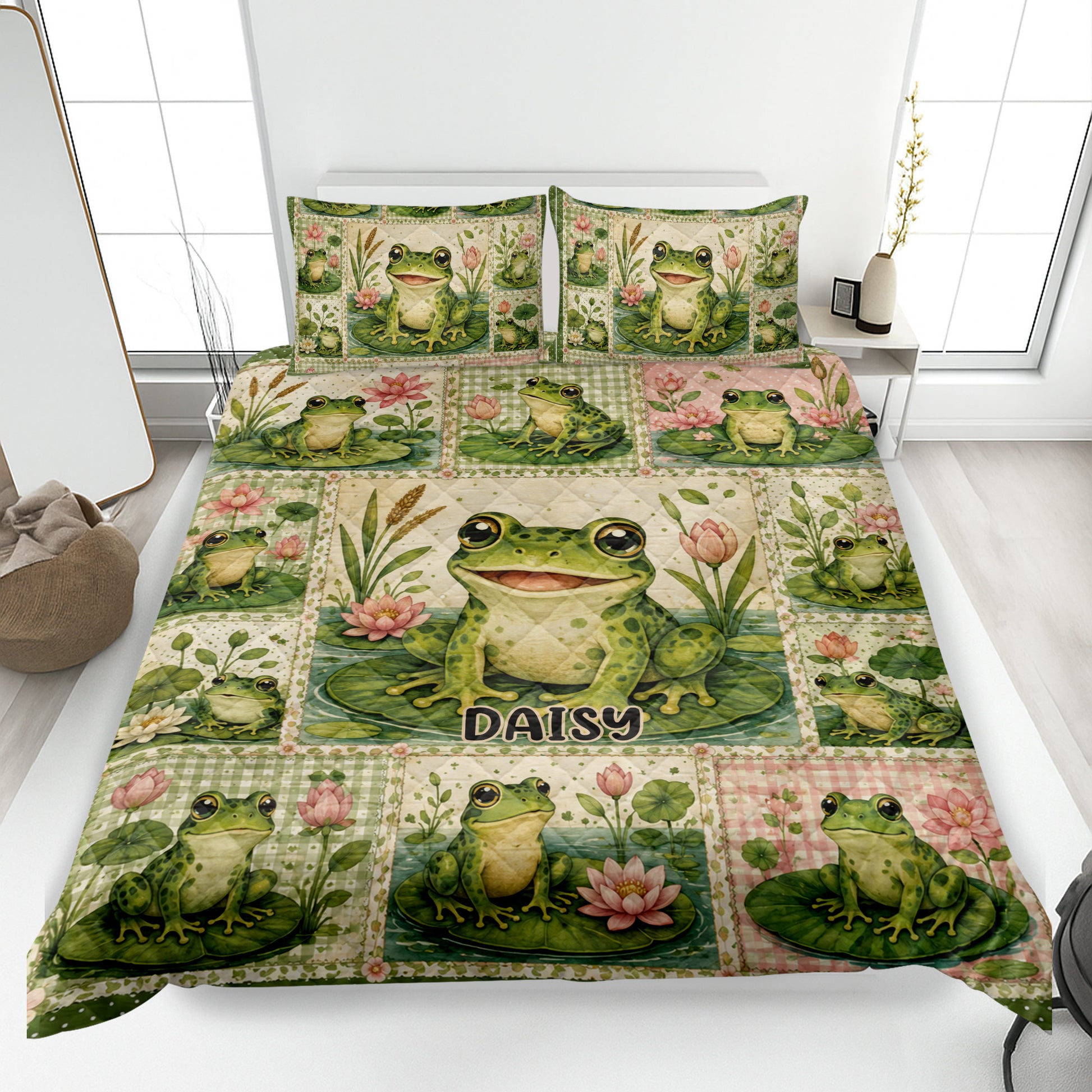 Frog quilt bedding set displayed on a bed with green frogs, lily pads, and pink water lilies
