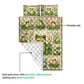 Frog quilt detail showing the colorful printed front and white diamond-quilted backing