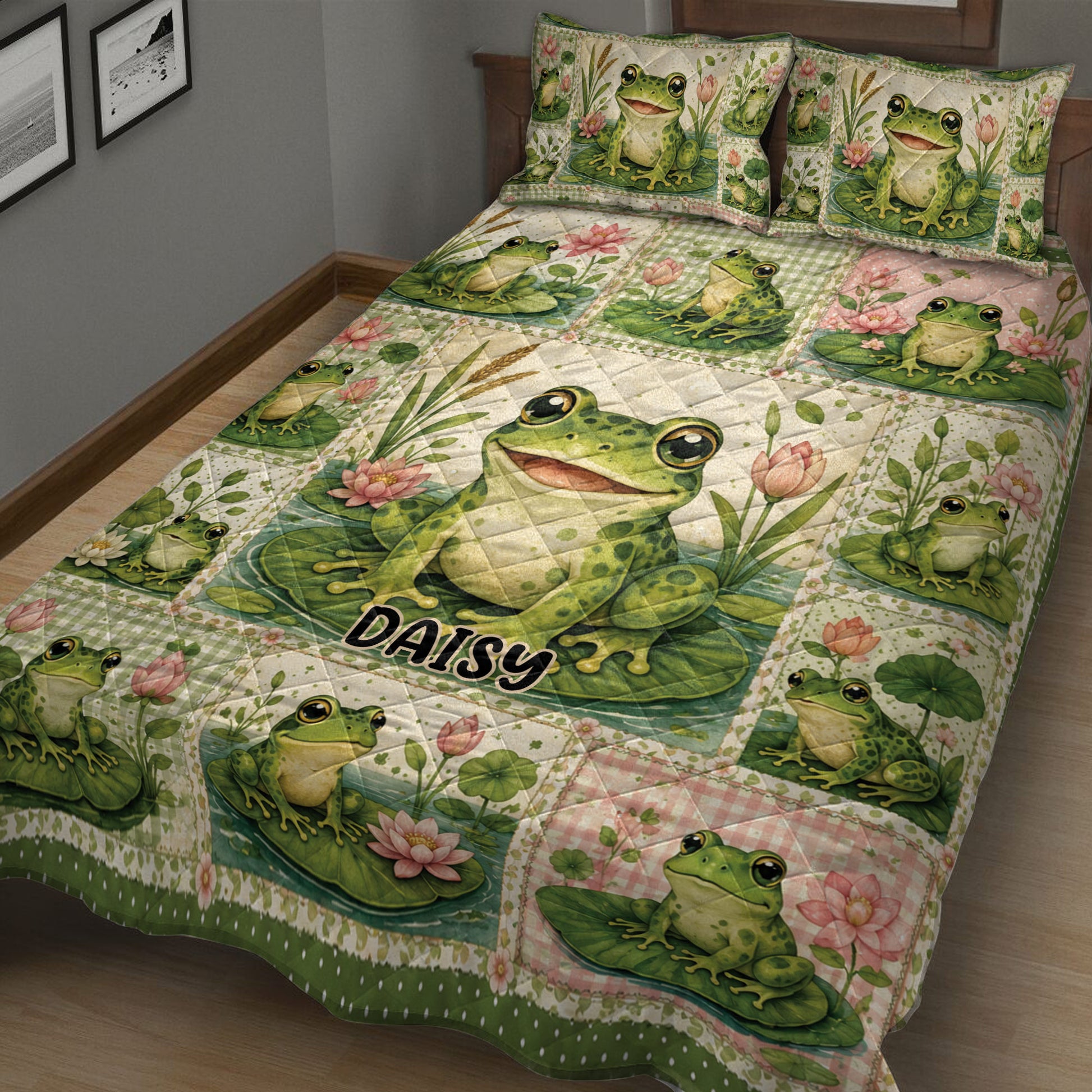 Close bedroom view of a frog quilt blanket with pond flowers and playful green frog artwork