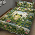 Frog pond quilt bedding set shown in a cozy bedroom with colorful frog scenes and floral water garden details