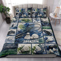 Badminton quilt blanket styled on a bed with blue and green racket, shuttlecock, and court artwork