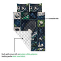 Badminton quilt detail showing the printed racket and shuttlecock design with a quilted white reverse side