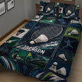 Close view of badminton quilt bedding with rackets, shuttlecocks, sports bags, and bold navy green graphics