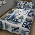 Angled bedroom view of a badminton quilt blanket featuring rackets, shuttlecocks, court imagery, and watercolor details