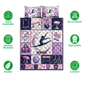 Gymnastics quilt bedding set shown with gymnast silhouettes, apparatus illustrations, and vibrant pink details