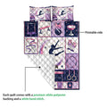 Gymnastics quilt showing the printed artwork side and white quilted backing