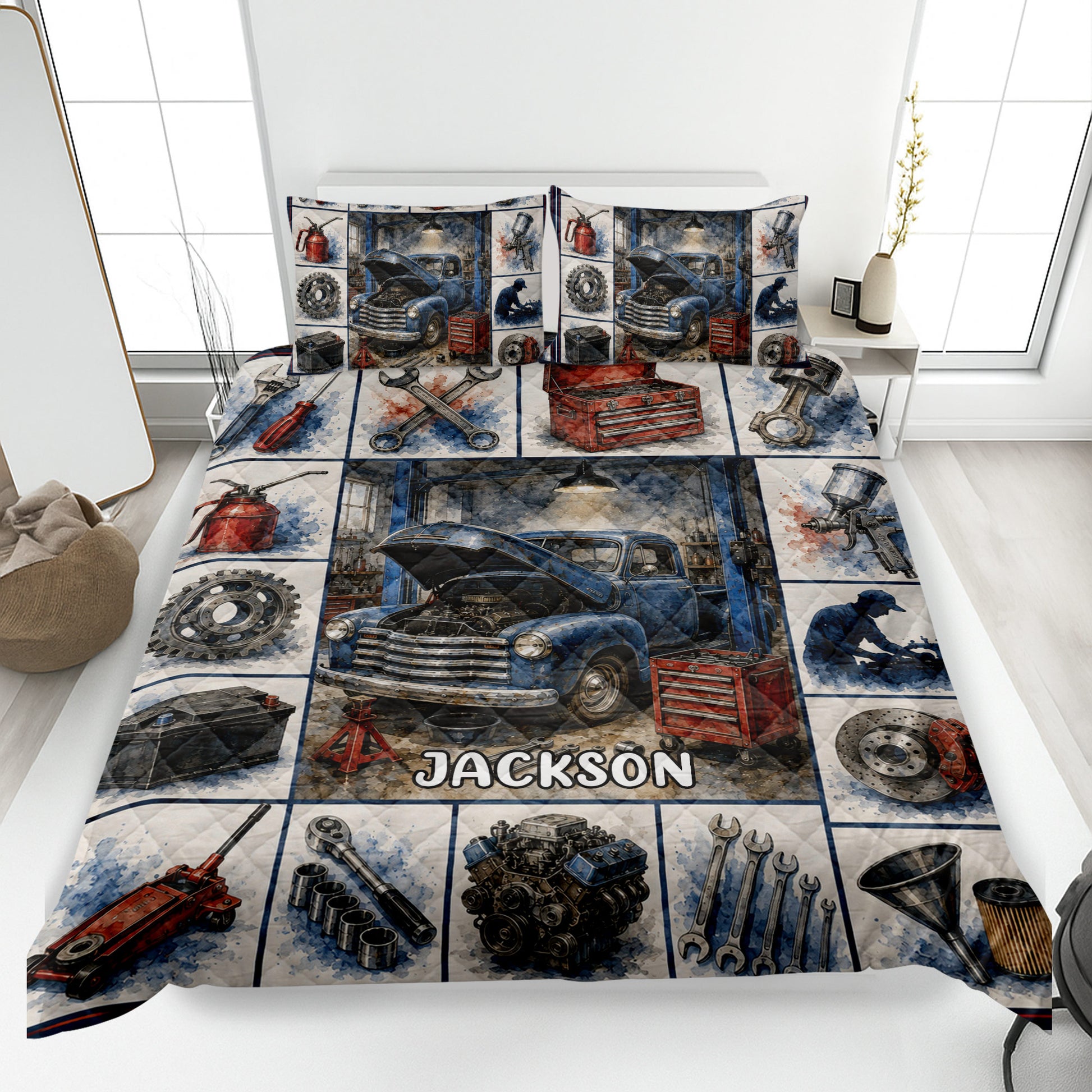 Mechanic quilt blanket displayed on a bed with vintage truck, tools, engine parts, and garage artwork