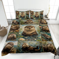 Otter quilt blanket spread across a bed with aquatic scenes, water lilies, and wildlife artwork