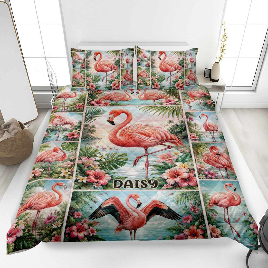 Tropical flamingo quilt blanket spread across a bed with pink flowers, palm leaves, and aqua water scenes