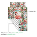 Flamingo quilt showing the colorful printed front and white diamond-stitched backing
