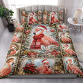 Christmas flamingo quilt blanket styled on a bedroom bed with matching festive flamingo pillow artwork