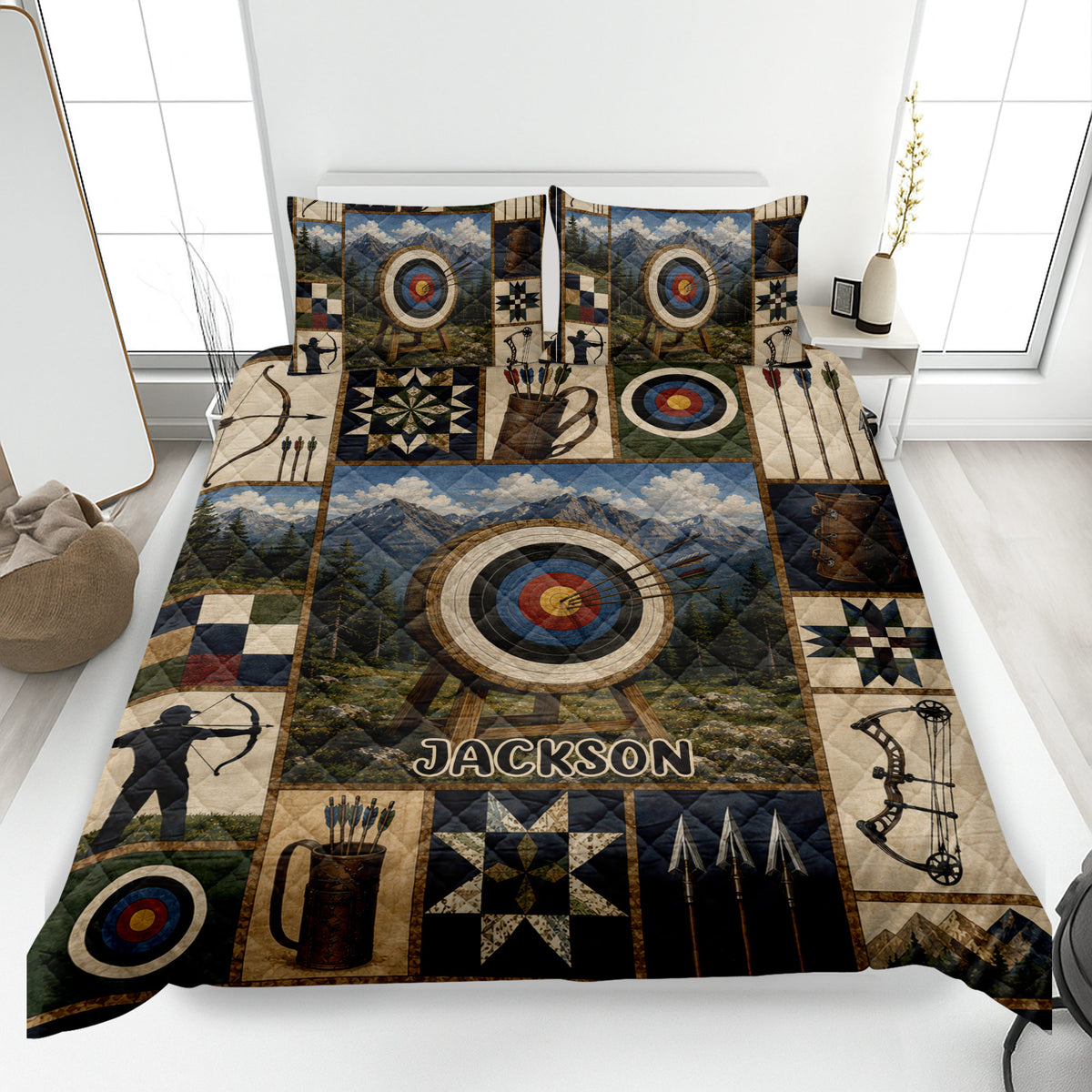 Archery quilt blanket displayed on a bed with mountain scenery, targets, bows, arrows, and rustic outdoor artwork