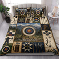 Rustic archery quilt blanket styled on a bedroom bed with mountain target and bow artwork