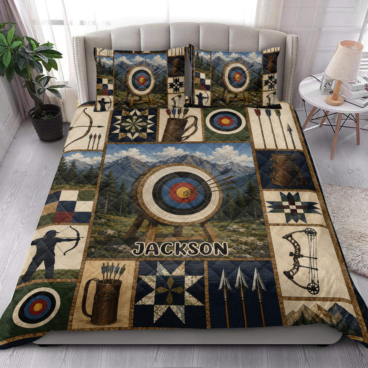 Rustic archery quilt blanket styled on a bedroom bed with mountain target and bow artwork