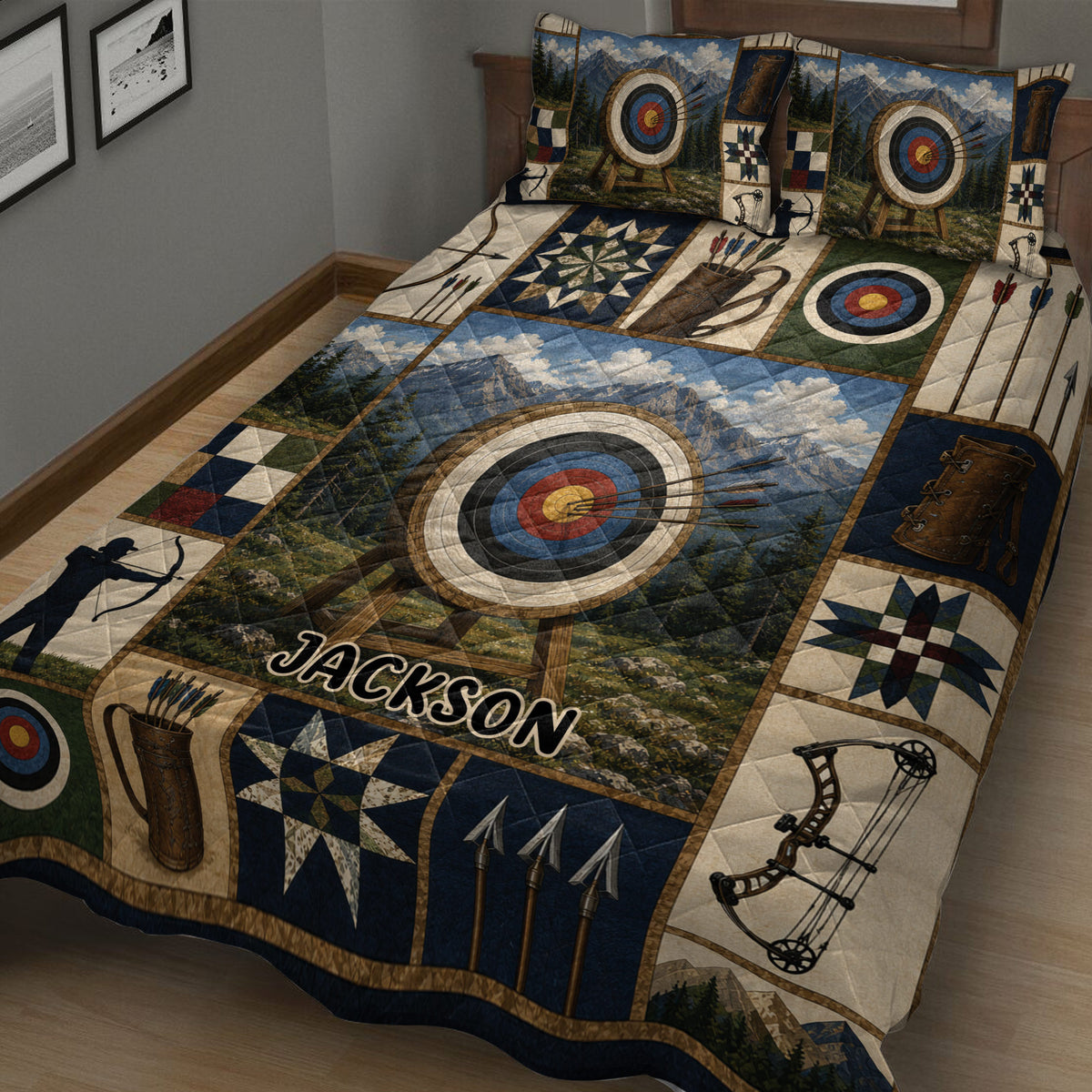Close-up of archery quilt bedding featuring targets, bows, arrows, quivers, mountains, and patchwork details