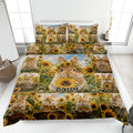 Rabbit quilt bedding set with sunflower artwork displayed on a bright bedroom bed