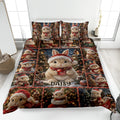 Rabbit Christmas quilt blanket displayed on a bed with festive woodland scenes and red holiday accents