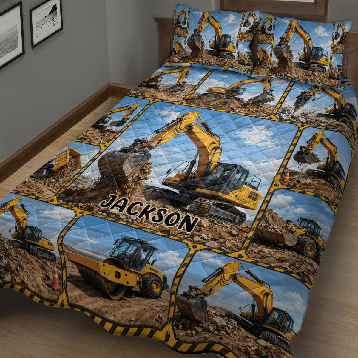 Close view of an excavator quilt blanket featuring heavy equipment at a construction site