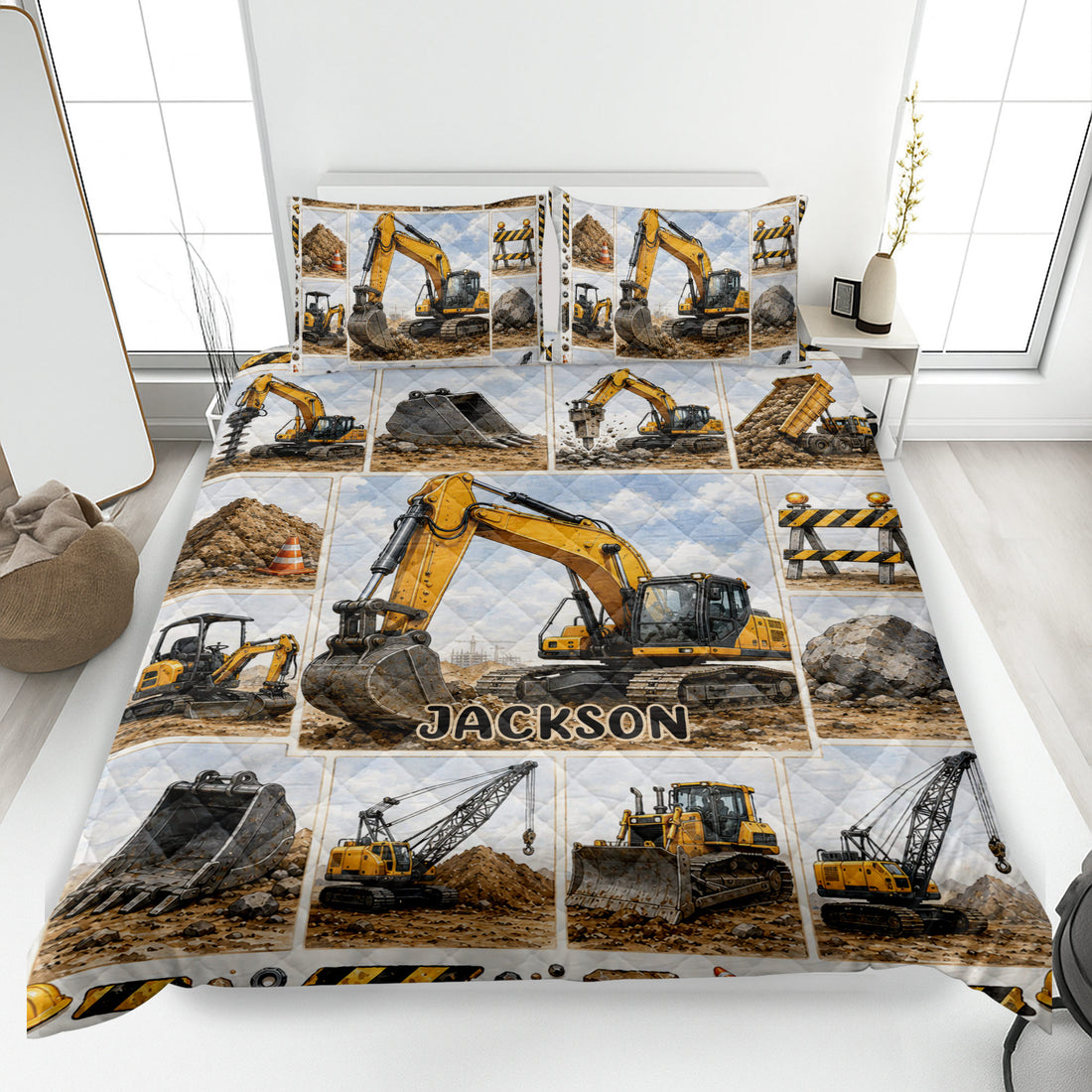 Excavator quilt blanket displayed on a bed with construction equipment artwork and yellow worksite details