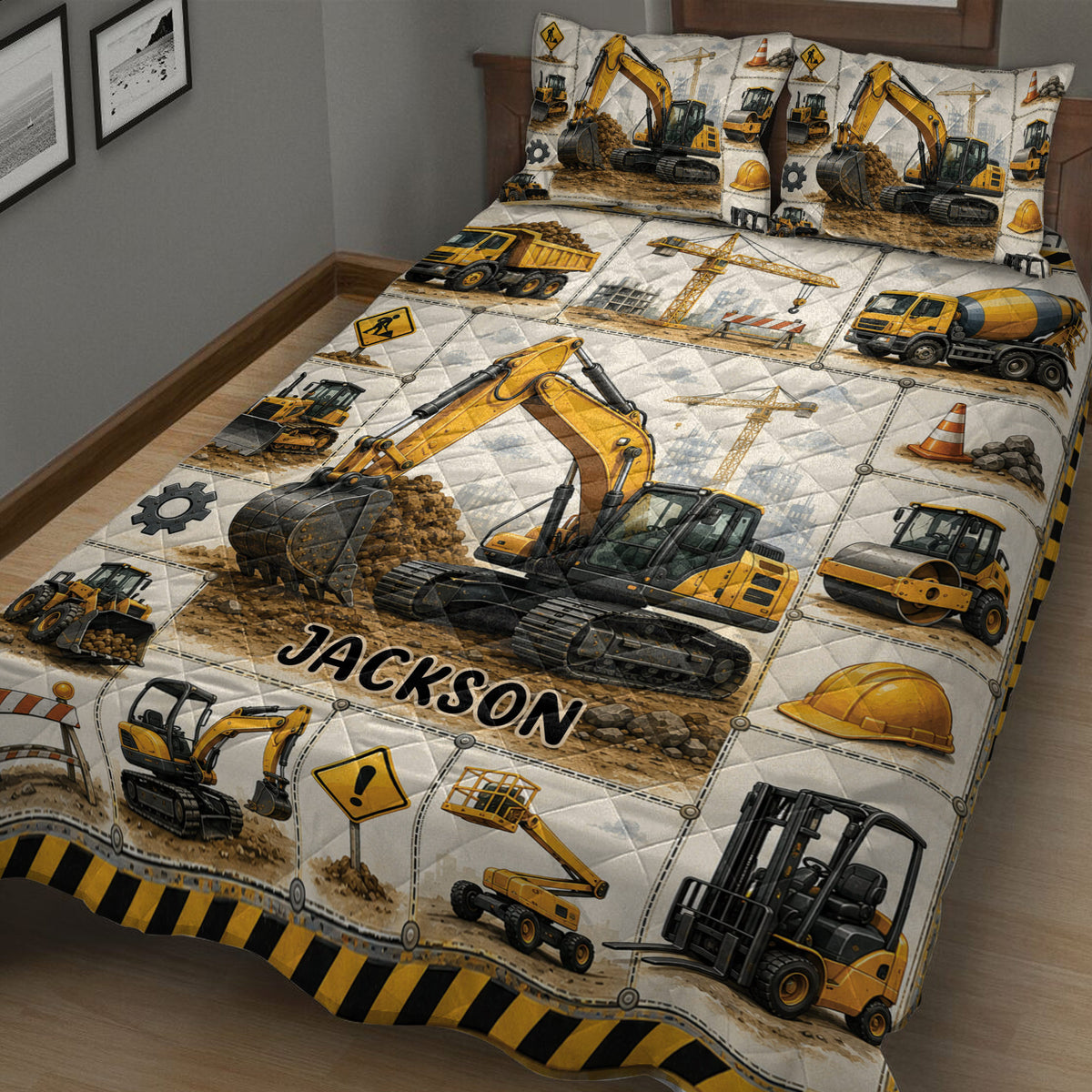 Construction vehicle quilt blanket shown across a bed with excavators and heavy equipment