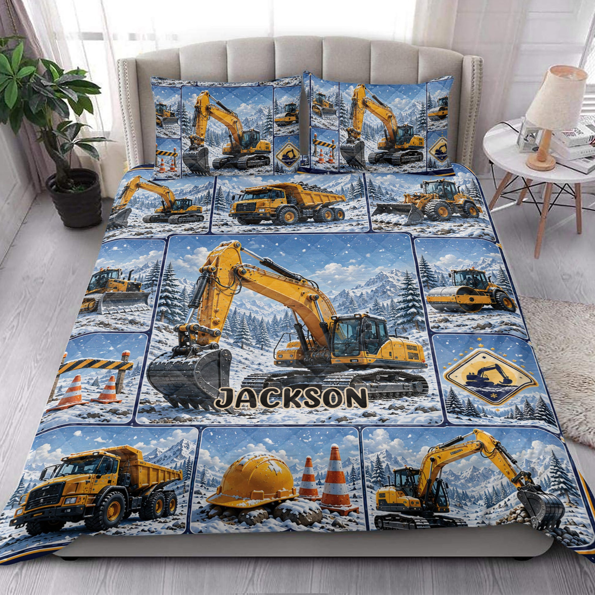 Excavator quilt bedding set styled in a bedroom with yellow construction vehicles and snowy mountain artwork