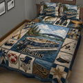 Pontoon boat quilt blanket shown on a bed with fishing, boating, dock, and lakeside cabin imagery