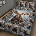 Close view of a moose quilt blanket with scarf-wearing wildlife scenes and snowy woodland details
