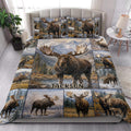 Moose quilt blanket styled in a bright bedroom with mountain and forest wildlife artwork