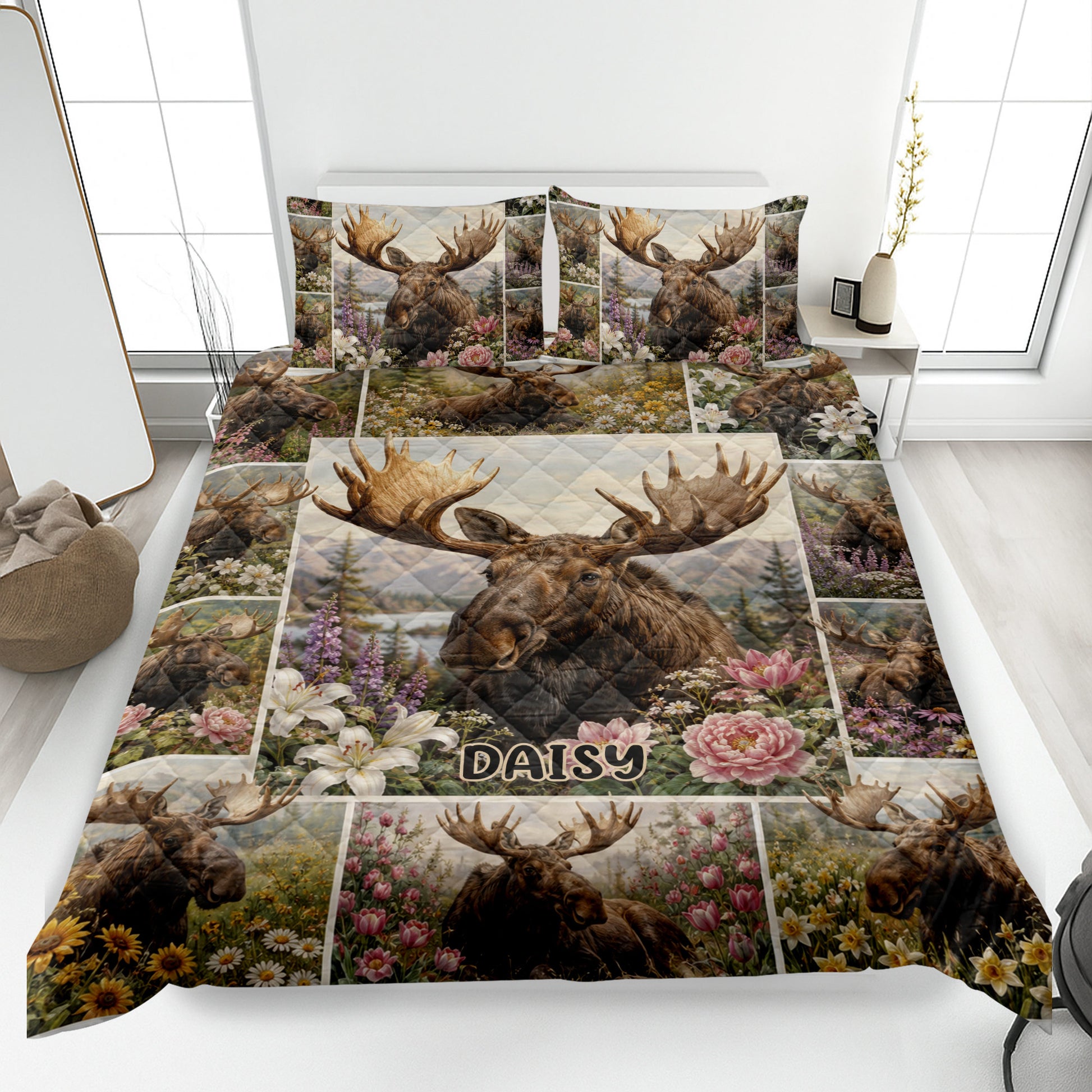 Moose quilt bedding set displayed on a bed with floral wildlife artwork and scenic mountain panels