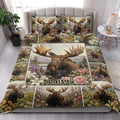 Moose quilt bedding set styled in a bright bedroom with floral forest wildlife artwork
