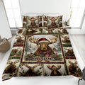 Moose quilt blanket displayed on a bed with Christmas woodland artwork, plaid accents, and pine greenery