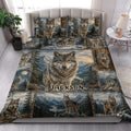 Wolf quilt bedding styled in a bright bedroom with dramatic mountain, forest, and moon artwork