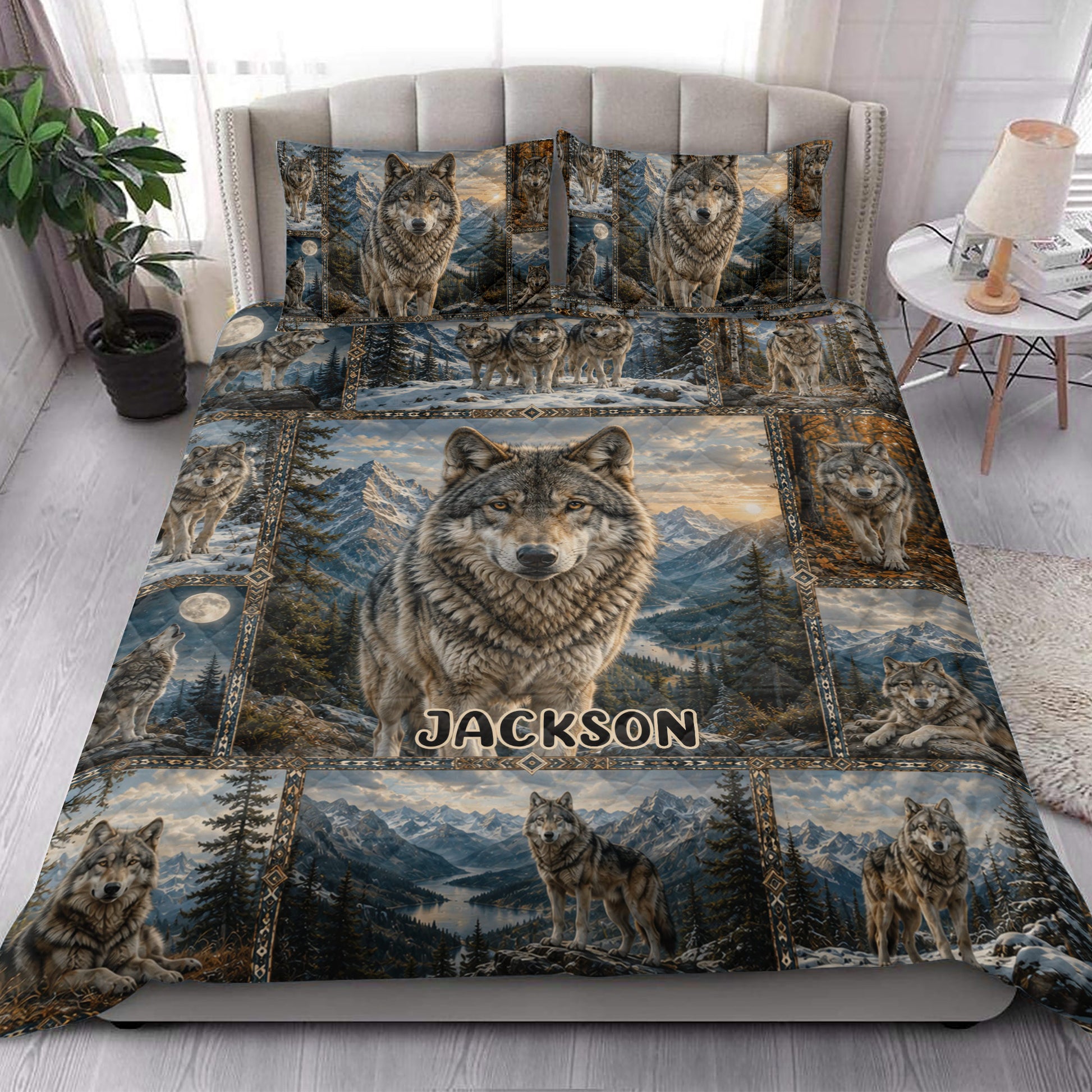 Wolf quilt bedding styled in a bright bedroom with dramatic mountain, forest, and moon artwork