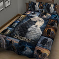 Close view of wolf quilt bedding with black and white wolves, mountain scenes, forests, and moonlit artwork