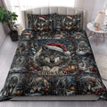 Wolf Christmas quilt blanket styled on a bedroom bed with snowy woodland artwork