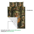 Close detail of tiger quilt showing the printed forest side and white diamond-stitched backing