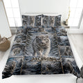 Tiger quilt blanket displayed on a bed with white tigers in a snowy forest scene