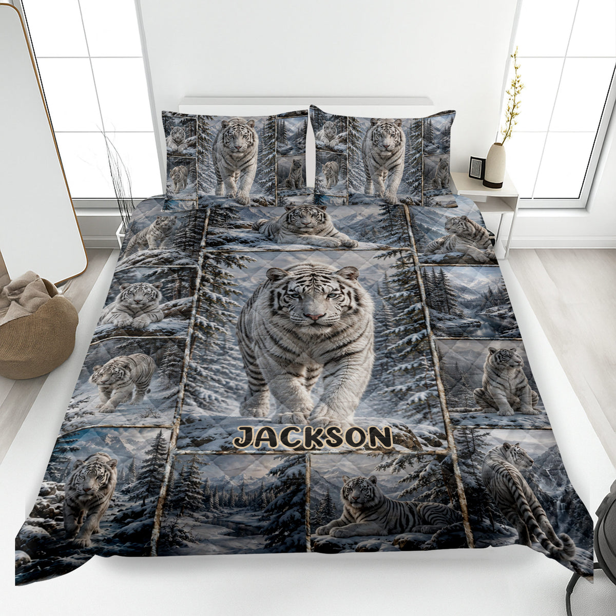 Tiger quilt blanket displayed on a bed with white tigers in a snowy forest scene