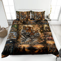 Tiger quilt bedding set displayed on a bed with tiger portraits, floral accents, and wildlife scenes