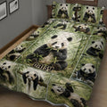 Close view of panda quilt bedding with detailed bamboo forest scenes and pandas across the bed