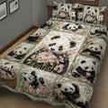 Close view of panda quilt blanket bedding with botanical flowers and playful panda scenes