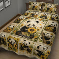 Close bedroom view of panda quilt blanket artwork featuring sunflowers, baskets, and playful pandas