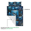 Shark quilt blanket showing a printed ocean side and white quilted reverse with stitched texture