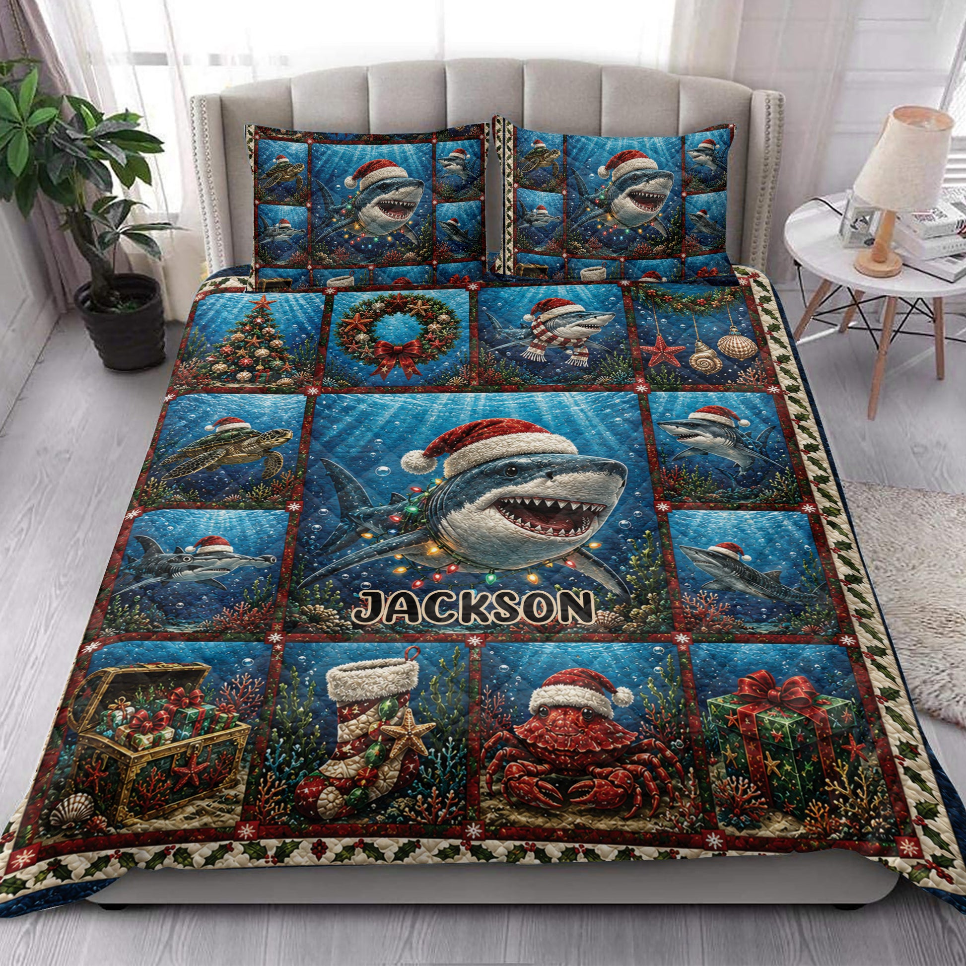 Christmas shark quilt blanket styled on a bed with colorful underwater holiday artwork