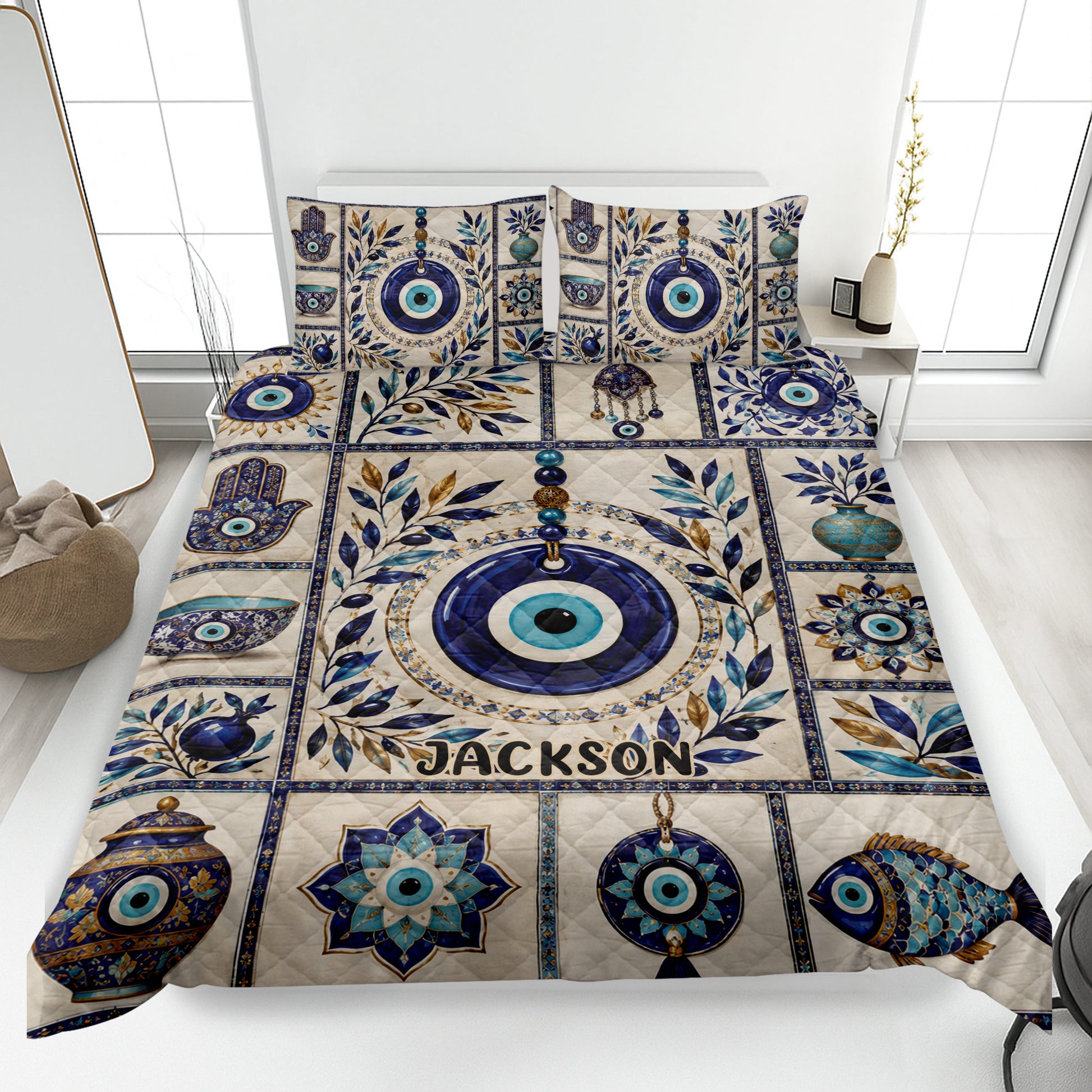 Evil Eye quilt blanket bedding set displayed on a bed with blue eye motifs, Hamsa hands, vases, and botanical accents