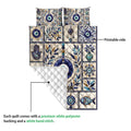 Evil Eye quilt blanket close-up showing the printed front, diamond quilting, Hamsa symbols, and blue decorative motifs