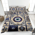 Evil Eye quilt blanket bedding set displayed on a bed with blue, cream, and gold protective eye artwork