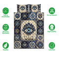 Evil Eye quilt bedding set displayed flat with blue and gold mandala eye artwork and feature icons